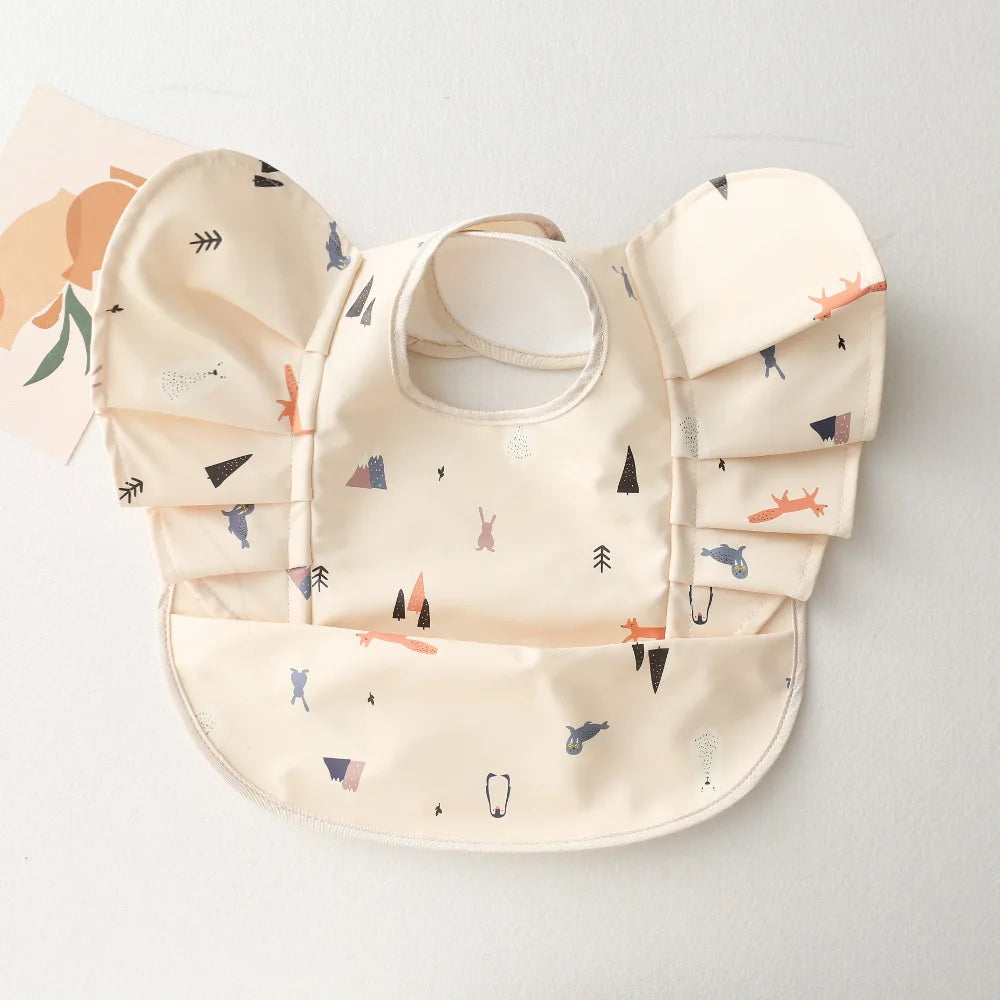 Bavoir bébé imperméable manches courtes à poche - Kassie