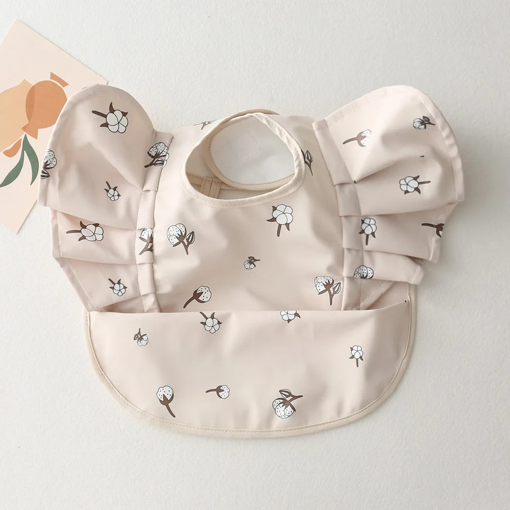 Bavoir bébé imperméable manches courtes à poche - Kassie