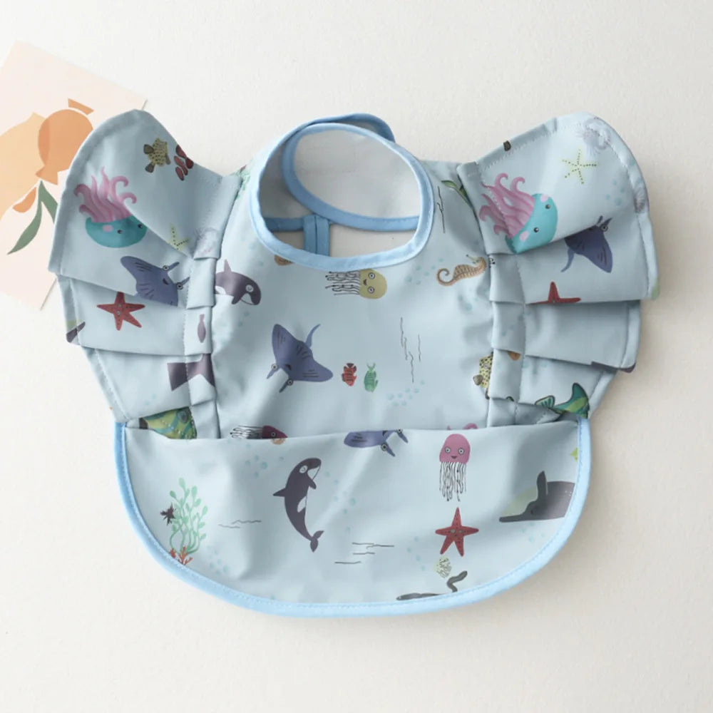 Bavoir bébé imperméable manches courtes à poche - Kassie