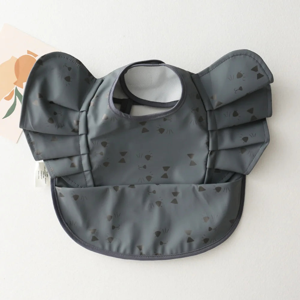 Bavoir bébé imperméable manches courtes à poche - Kassie
