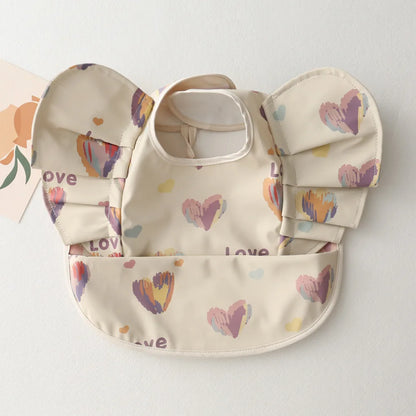 Bavoir bébé imperméable manches courtes à poche - Kassie
