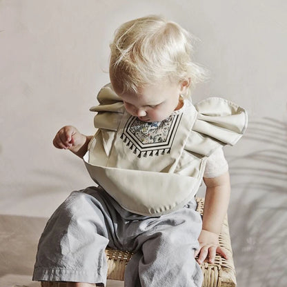 Bavoir bébé imperméable manches courtes à poche - Kassie